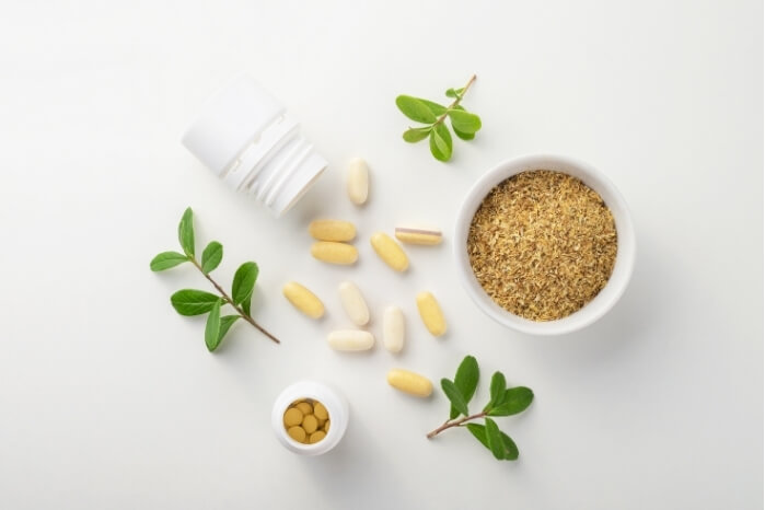 natural supplements including herbal capsules and dried herbs