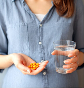 woman holding natural supplements with a glass of water